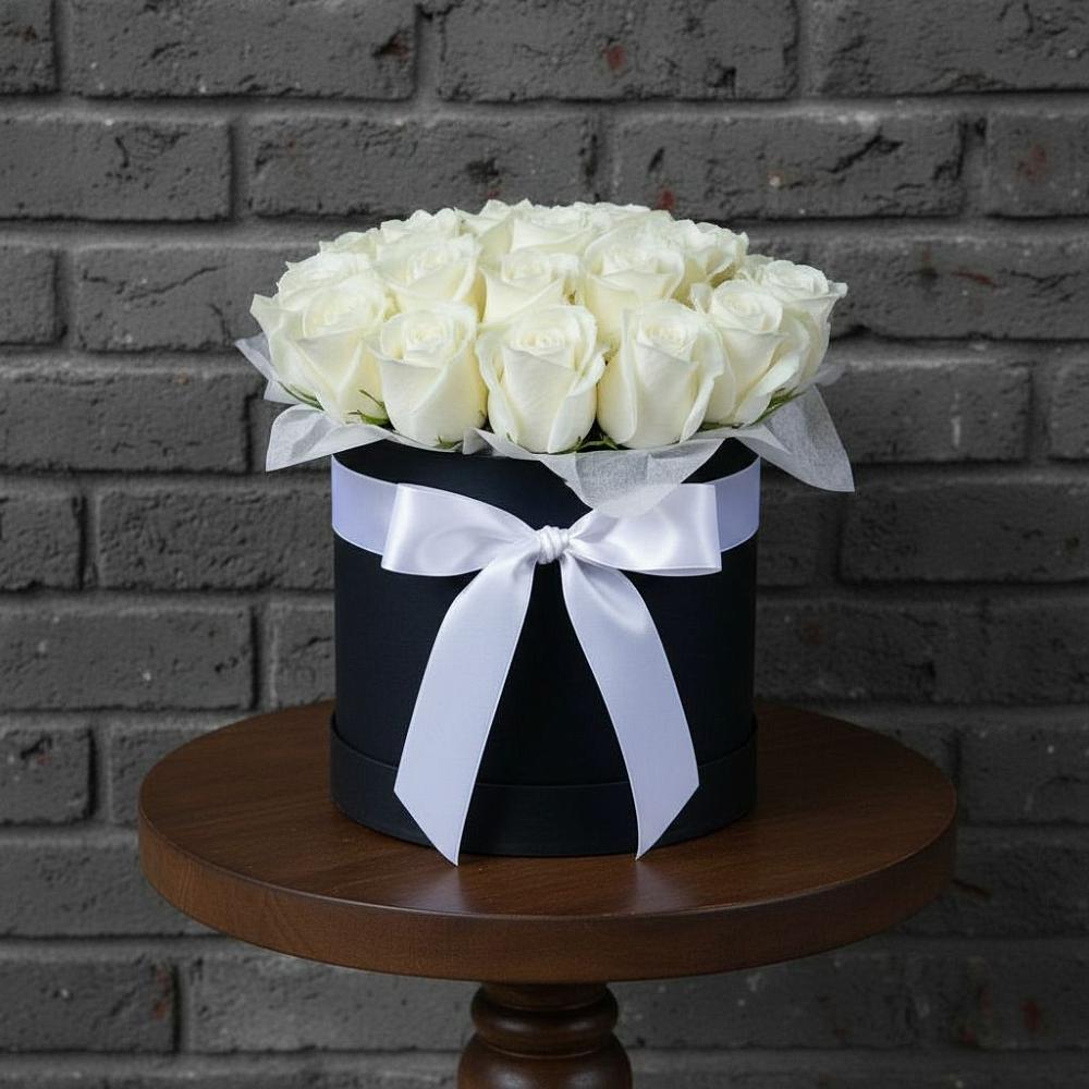 Цветочная композиция из Розы в шляпной коробке в Солнечногорске